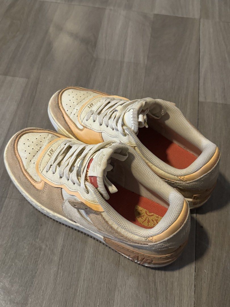Nike Airforce 1 Sisterhood Shadow (Category: Sneakers) located in Muntinlupa City. Submitted by stuffdcloset (Listing ID 1463966024, Image 2). Description: - US W 8.5 - Bought in the US for $120 - Nike Air Force 1 Shadow sneakers - Beige and orange colorway - Suede and leather accents - Lightly used, but needs cleaning.