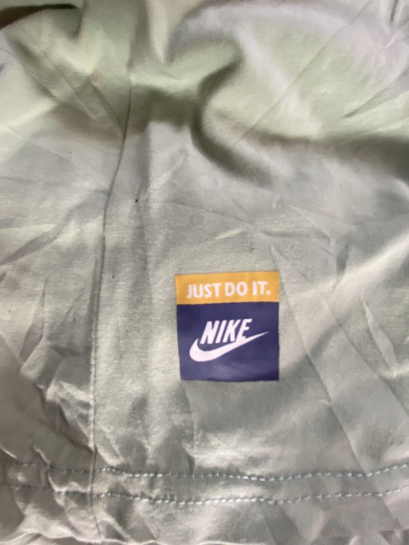 NIKE Box Logo Tee Sage Green 2XL (Category: Tshirts & Polo Shirts ) located in Manila. Submitted by jayve_montecillo (Listing ID 1463997994, Image 3). Description: NIKE Big Swoosh Graphic Tee Sage Green • Brand: NIKE - Authentic with neck tag + hem tag • Size: 2XL on tag | Dimes: W20 x L27 | Chest 40” • Color: Sage Green with Orange Box + Navy Swoosh • Condition: 7.5/10 - May 2-3 small dots/stains sa harap see last pics. Print goods pa, no cracks