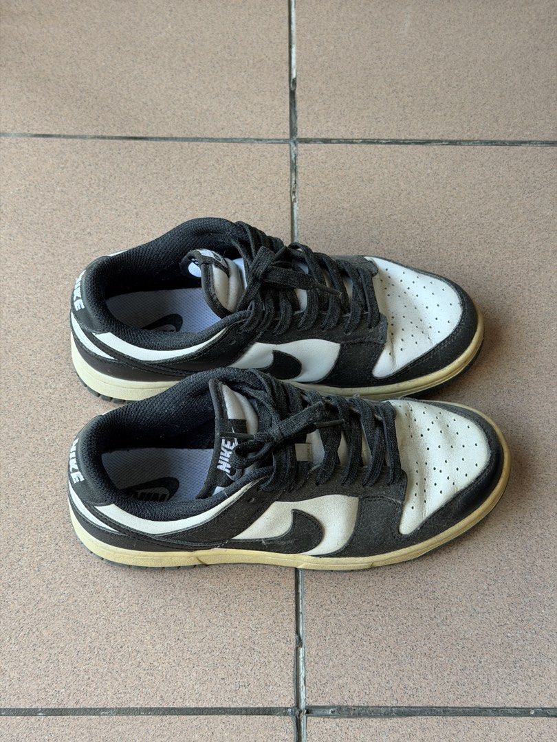 Nike Dunk Low Panda (Category: Sneakers) located in Cavite. Submitted by nikka.am (Listing ID 1463963611, Image 2). Description: - color: white and black - size: 7 US women / 24cm - 100% original bought in japan - with box - will wipe to simply remove dust before shipping - yellowish sole, manage your expectations (may need thorough cleaning to restore sole color).