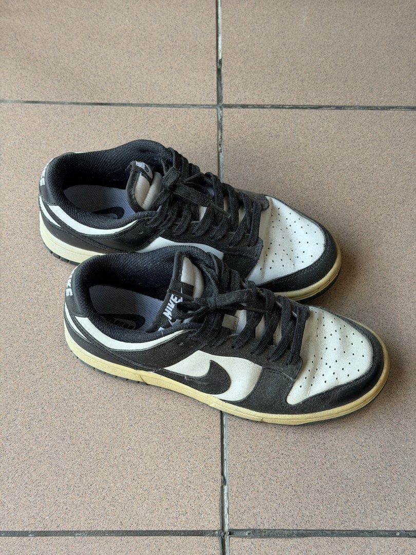 Nike Dunk Low Panda (Category: Sneakers) located in Cavite. Submitted by nikka.am (Listing ID 1463963611, Image 3). Description: - color: white and black - size: 7 US women / 24cm - 100% original bought in japan - with box - will wipe to simply remove dust before shipping - yellowish sole, manage your expectations (may need thorough cleaning to restore sole color).