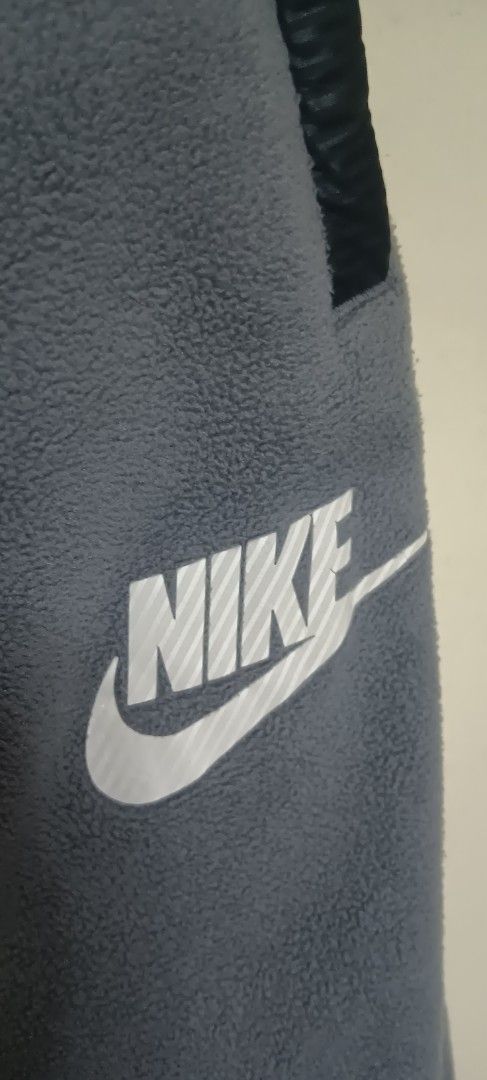 Nike Grey Fleece Jogger Pants (Category: Babies & Kids Fashion) located in Bacoor. Submitted by jajcollections (Listing ID 1464081178, Image 3). Description: RFS: Outgrown - Grey Nike fleece joggers - Elastic waistband with drawstring - Two side pockets with black trim - Cuffed ankles - Soft and warm material - Ideal for casual wear or sports.