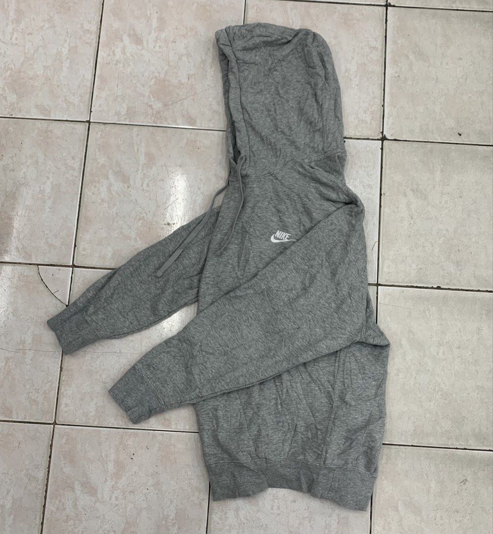 Nike Grey Hoodie Pullover Sweatshirt XXL (Category: Hoodies) located in Cebu City. Submitted by jkeive (Listing ID 1463963717, Image 2). Description: - Grey Nike Hoodie - Size: XXL - Best fit XL (23x28) Dimension - Material: 80% Cotton, 20% Polyester (Body); 100% Polyester (Hood Lining) - Features: Embroidered Nike logo on chest, front kangaroo pocket, adjustable hood drawstrings - Origin: Made in China - Ideal for: Casual wear, everyday comfort.