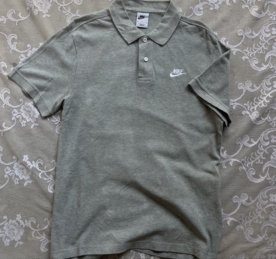 Nike Grey Polo Shirt - Size M (Category: Tshirts & Polo Shirts ) located in Manila. Submitted by trustedmichael. (Listing ID 1464078073, Image 2). Description: Nike club mens/ Cement grey W 21 L 27 M on Tag ✅Excellent ✅Can do vc for item checking/assurance - Classic embroidered Nike swoosh logo on chest - Two-button placket - Made from comfortable fabric - Perfect for casual wear or a sporty look - Versatile and easy to pair with any outfit.