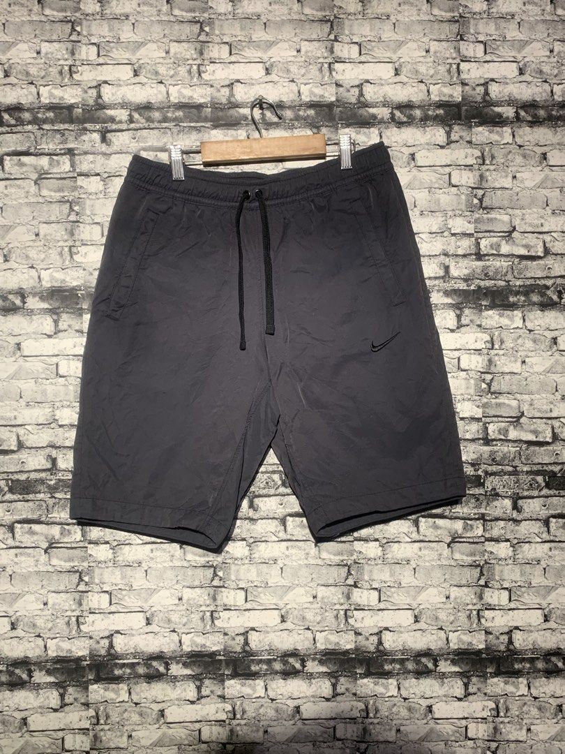 Nike Grey Shorts Men's Size M (Category: Shorts) located in Manila. Submitted by marksaban81396 (Listing ID 1463965984, Image 2). Description: Nike short Waistline 30-32 Lenght 20 Leg open 9.5 Color rate 9.5/10 No issue Excellent condition - Grey Nike shorts - Elastic waistband with drawstring - Two side pockets - Comfortable for workouts or casual wear.