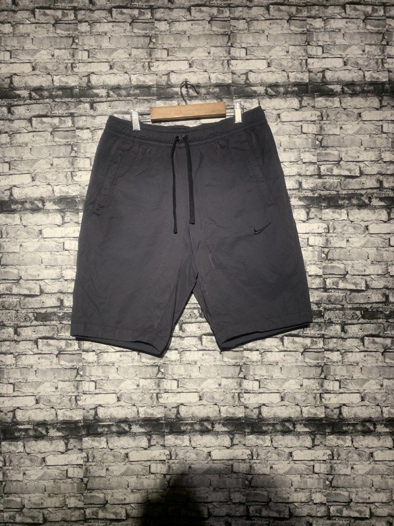 Nike Grey Shorts Men's Size M (Category: Shorts) located in Manila. Submitted by marksaban81396 (Listing ID 1463965984, Image 3). Description: Nike short Waistline 30-32 Lenght 20 Leg open 9.5 Color rate 9.5/10 No issue Excellent condition - Grey Nike shorts - Elastic waistband with drawstring - Two side pockets - Comfortable for workouts or casual wear.