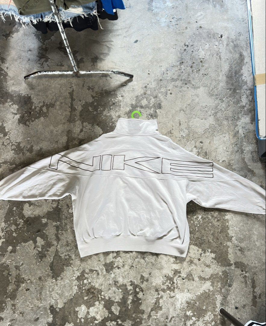 Nike Half Zip Sweatshirt XXL (Category: Coats, Jackets and Outerwear) located in Cavite. Submitted by remcadzzz (Listing ID 1463962542, Image 3). Description: - Lightweight Nike sweatshirt - Half-zip neckline with stand-up collar - Large Nike graphic on the back - Subtle Nike logo on the front chest - Two front pockets - Made in China - No issue - Excellent Condition - 27x27 .