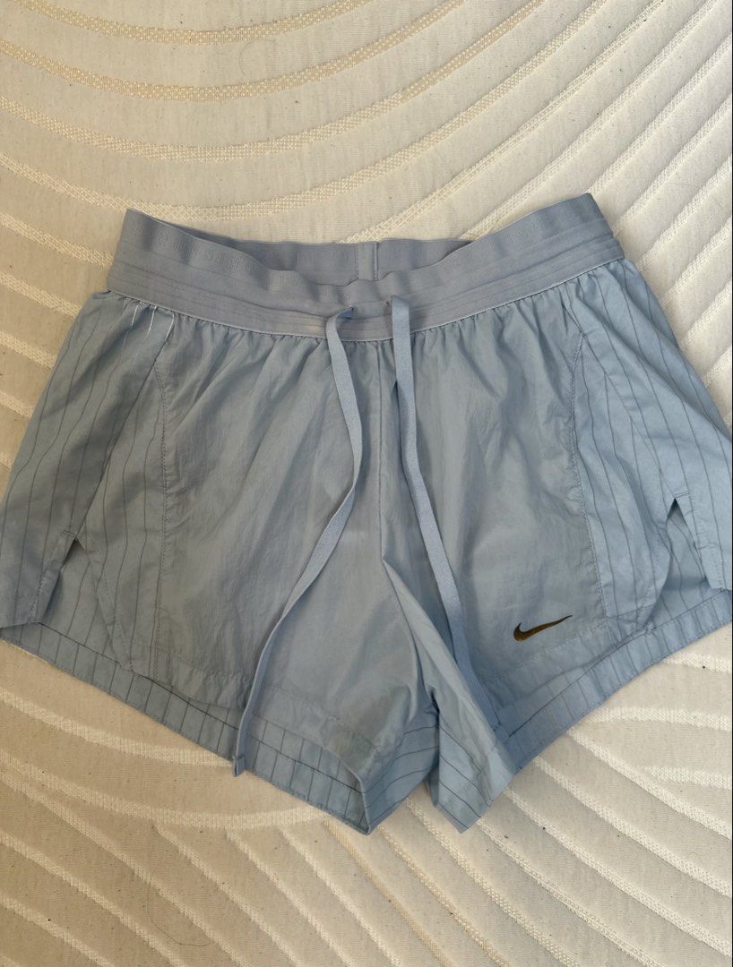 Nike Light Blue Running Division shorts (Category: Activewear) located in Quezon City. Submitted by tan__k (Listing ID 1463955759, Image 3). Description: Authentic Size S Color light blue Condition: Excellent, no flaws Description: pinstriped paneled crinkeled-shell Mid-Rise Brief-Lined Lightweight shorts NO lowballers, No more haggling unless buying 2 or more items from my list :).