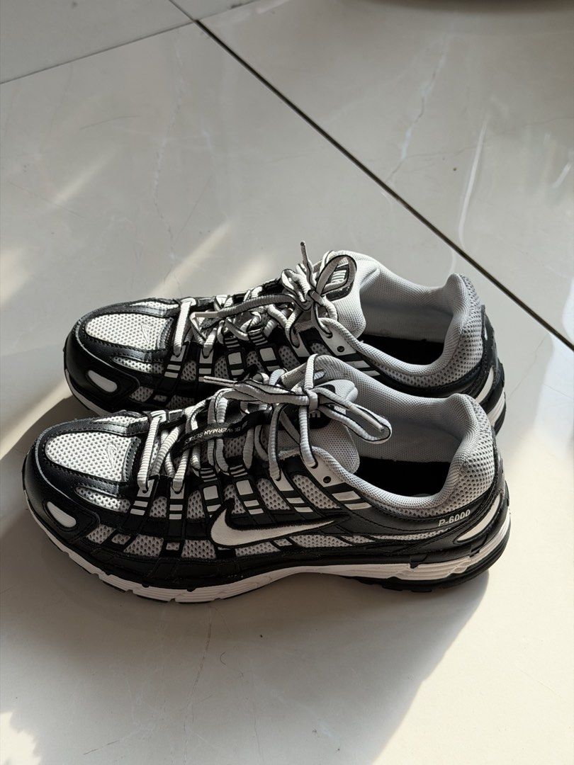 Nike P-6000 "Silver Bullet" Running Shoes (Category: Sneakers) located in Pasay City. Submitted by rjzbrown (Listing ID 1464001992, Image 1). Description: - Nike P-6000 running shoes - Classic black and white colorway - Features mesh and synthetic overlays - Comfortable and stylish for everyday wear - Great for workouts or casual outings - Grab these cool kicks!.