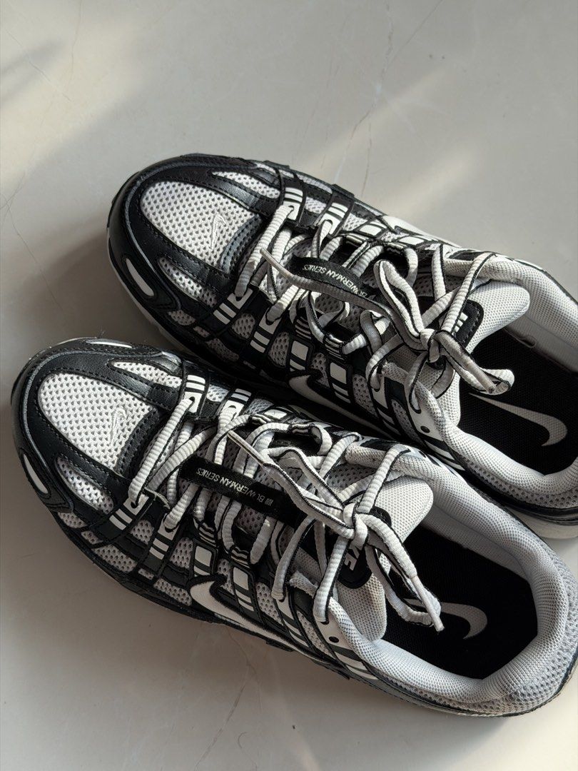 Nike P-6000 "Silver Bullet" Running Shoes (Category: Sneakers) located in Pasay City. Submitted by rjzbrown (Listing ID 1464001992, Image 2). Description: - Nike P-6000 running shoes - Classic black and white colorway - Features mesh and synthetic overlays - Comfortable and stylish for everyday wear - Great for workouts or casual outings - Grab these cool kicks!.