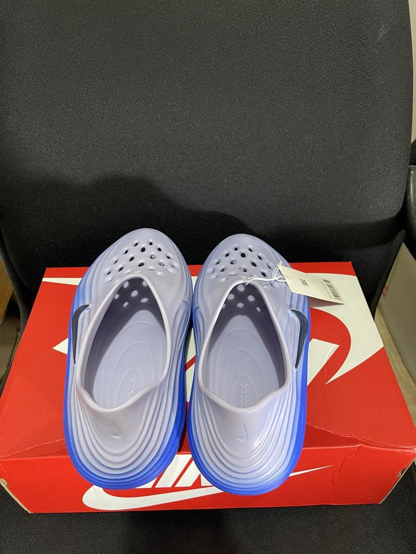 Nike ReactX Rejuven8- Midnight Navy (Category: Slippers & Slides) located in Baguio. Submitted by snappzy (Listing ID 1464009491, Image 3). Description: •Original and Brand New •Complete with tag and box •Size: US 10 and 11 available •Can ship nationwide, SF to be shouldered by buyer.