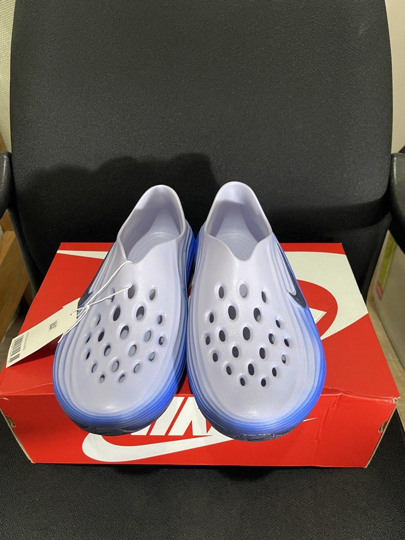 Nike ReactX Rejuven8- Midnight Navy (Category: Slippers & Slides) located in Baguio. Submitted by snappzy (Listing ID 1464009491, Image 2). Description: •Original and Brand New •Complete with tag and box •Size: US 10 and 11 available •Can ship nationwide, SF to be shouldered by buyer.
