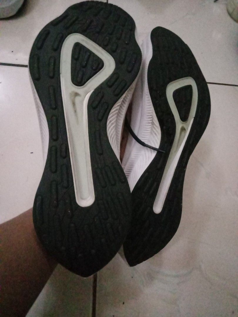 Nike Running Shoes (Category: Sneakers) located in Rosario. Submitted by gmarilyn1934608 (Listing ID 1463939007, Image 3). Description: - Nike Running Shoes - US Size: 8 - Color: Beige, Peach, Black mix - Lightweight design for performance - Ideal for running and gym workouts - Made in Indonesia.