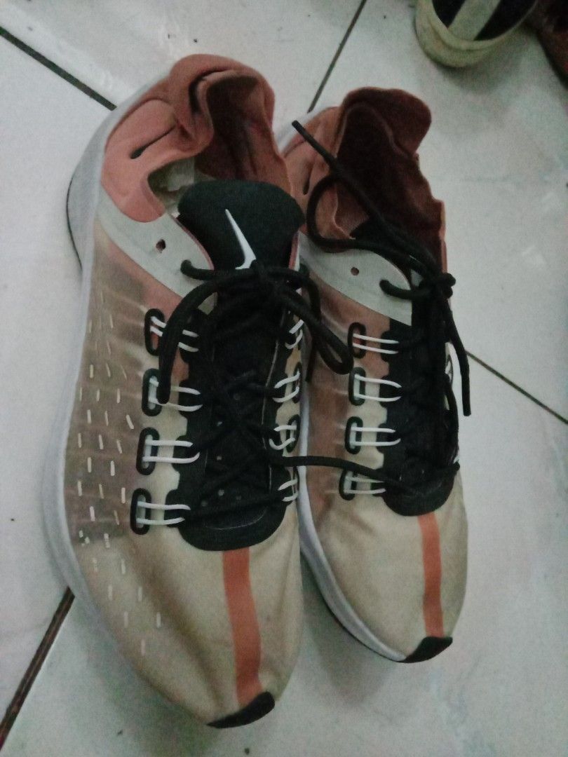 Nike Running Shoes (Category: Sneakers) located in Rosario. Submitted by gmarilyn1934608 (Listing ID 1463939007, Image 1). Description: - Nike Running Shoes - US Size: 8 - Color: Beige, Peach, Black mix - Lightweight design for performance - Ideal for running and gym workouts - Made in Indonesia.