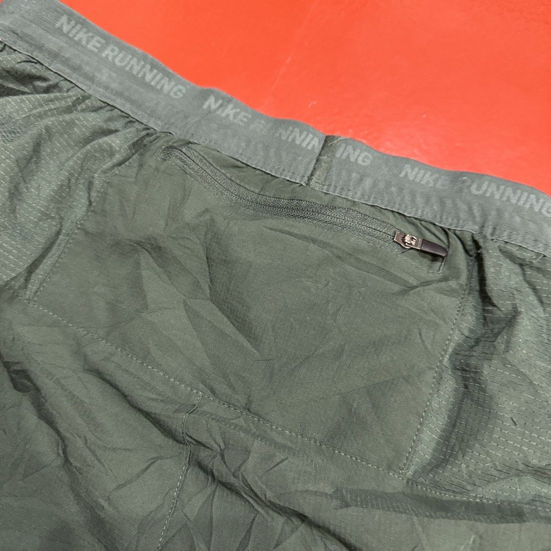 NIKE RUNNING SHORTS (Category: Shorts) located in Pasig City. Submitted by buzzthrifty (Listing ID 1463950798, Image 3). Description: SIZE 32-38WAIST 15.5" LENGTH 13" LEG HOLE EXCELLENT CONDITION .