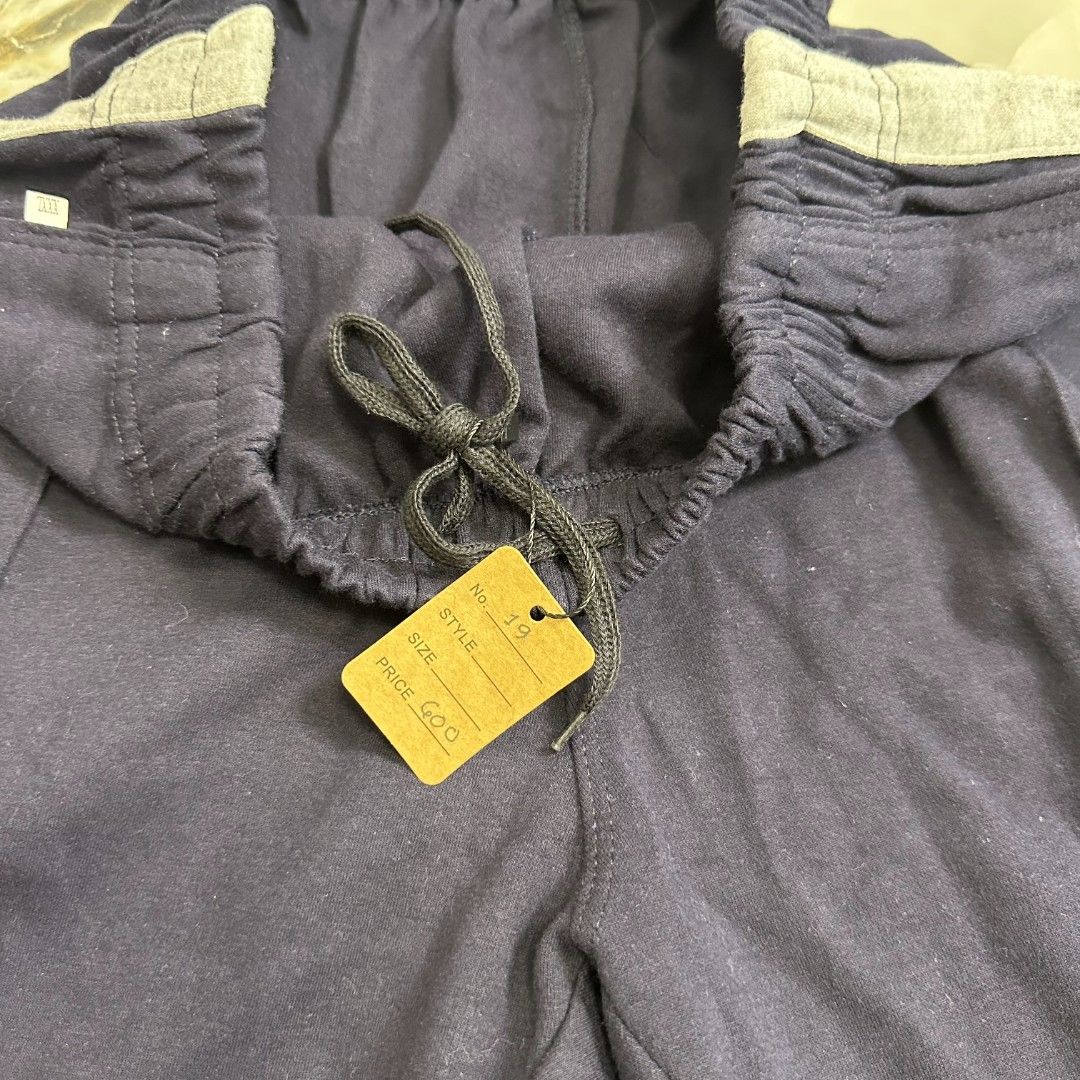 Nike Shorts (Category: Shorts) located in Baguio. Submitted by kayeonlineshop (Listing ID 1463992480, Image 3). Description: dark navy blue athletic shorts featuring an elastic waistband and a small white Nike logo printed on the left leg no tag w28-30 l23 h25.