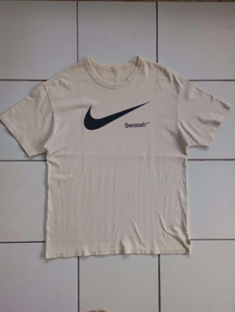 Nike Swoosh Printed Design (Category: Tshirts & Polo Shirts ) located in Iriga City. Submitted by cxvgarments (Listing ID 1464012760, Image 1). Description: - Crewneck - Minimalist design - Perfect for dailyfits - As new Condition - Best fit: Large - XL - Issue: ❌ - Condition: 10/10.