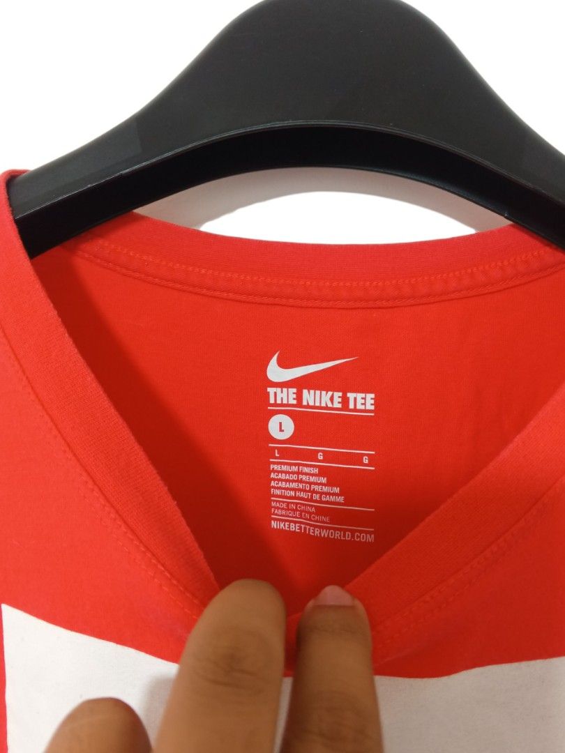 Nike Tee (Category: Tshirts & Polo Shirts ) located in Cebu City. Submitted by authenticgrids (Listing ID 1463952462, Image 3). Description: The Nike Tee Color : Red Orange Excellent Condition ✨ Issue/s: None Size L on tag Best Fit: Medium Dimensions Width 20 inches Length 26 inches 📥📥📥📥 Dm us for more details ☺️.