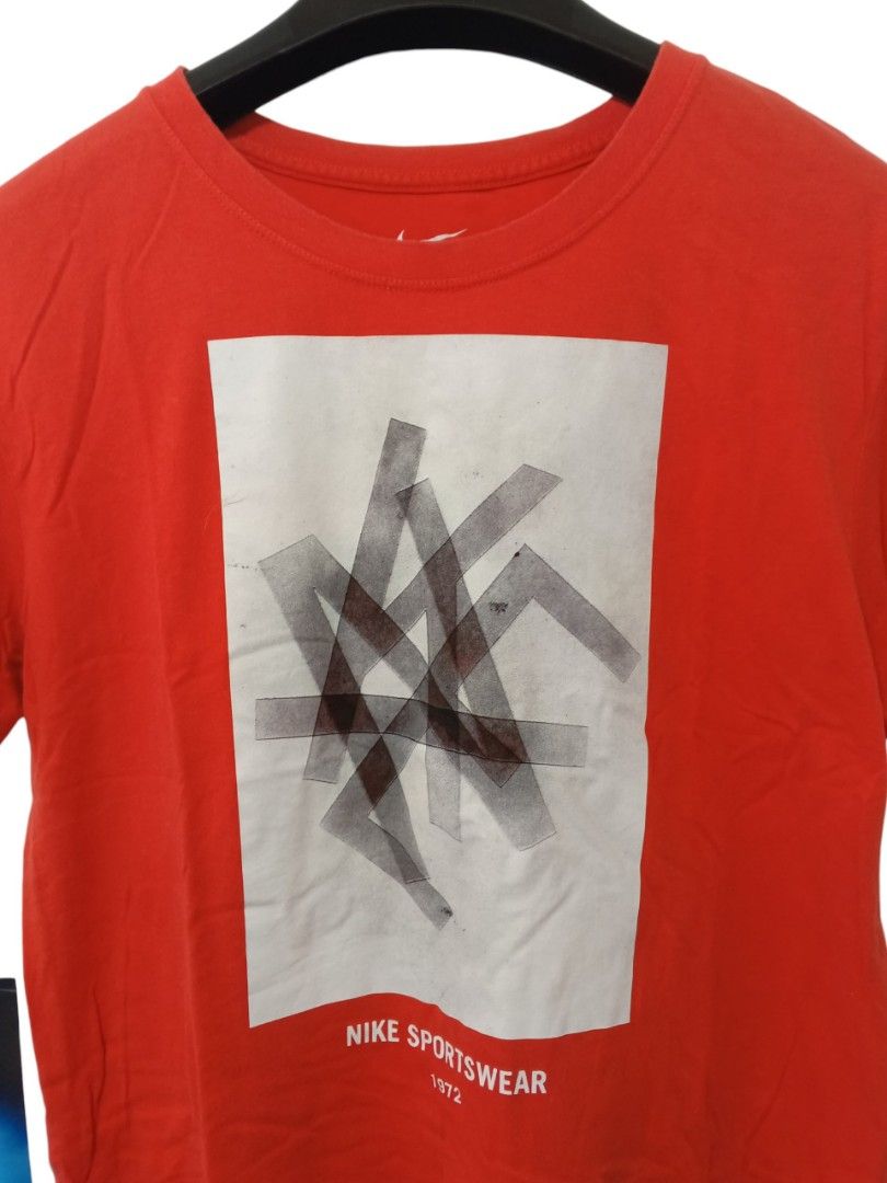 Nike Tee (Category: Tshirts & Polo Shirts ) located in Cebu City. Submitted by authenticgrids (Listing ID 1463952462, Image 2). Description: The Nike Tee Color : Red Orange Excellent Condition ✨ Issue/s: None Size L on tag Best Fit: Medium Dimensions Width 20 inches Length 26 inches 📥📥📥📥 Dm us for more details ☺️.