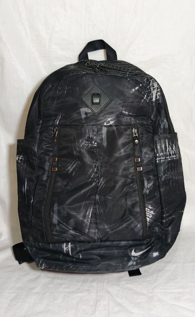 Nike-Auralux Backpack 'Black (Category: Backpacks) located in Baguio. Submitted by jdm.rvr24 (Listing ID 1463960537, Image 1). Description: *actual pictures posted* brand: Ni ke dimension in inches; height: 19 length: 13 width / thickness: 7 division: 1 main zip, 2 front zips, 2 side pockets material: nylon actual color: black color rate: 10/10 lock type: zipper working all zips adjustable strap condition: very good Reminder: Ukay stock is unpred