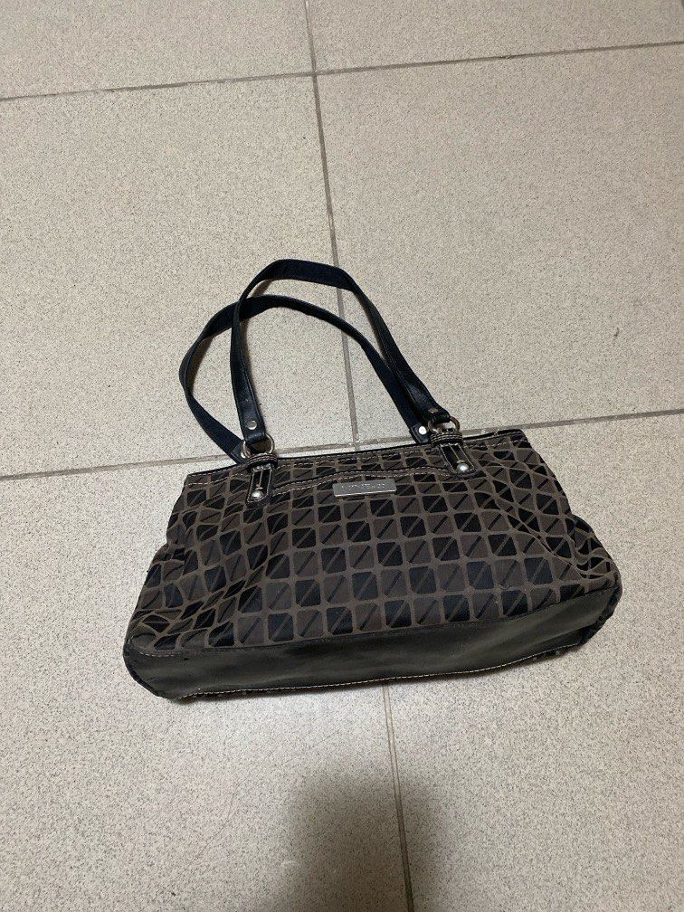 Nine & Co. by Nine West (Category: Shoulder Bags) located in Dagupan City. Submitted by maryennie (Listing ID 1464000887, Image 1). Description: Working zippers (all) Spacious interior Structured design Suitable for work, daily use or travel -Condition: Pre-loved, with visible signs of use such surface scratches/scuffs and some wear on the silver hardware. Please refer to photos for exact condition. ⭐️Selling as-is. Please inspect photos carefull