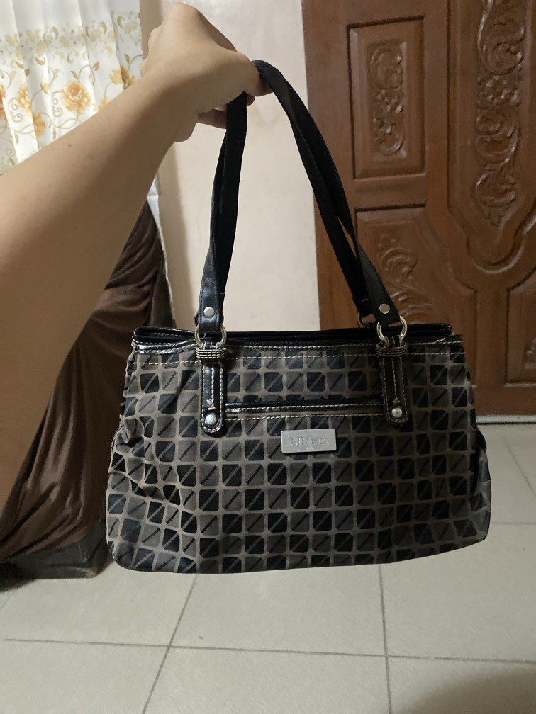 Nine & Co. by Nine West (Category: Shoulder Bags) located in Dagupan City. Submitted by maryennie (Listing ID 1464000887, Image 3). Description: Working zippers (all) Spacious interior Structured design Suitable for work, daily use or travel -Condition: Pre-loved, with visible signs of use such surface scratches/scuffs and some wear on the silver hardware. Please refer to photos for exact condition. ⭐️Selling as-is. Please inspect photos carefull