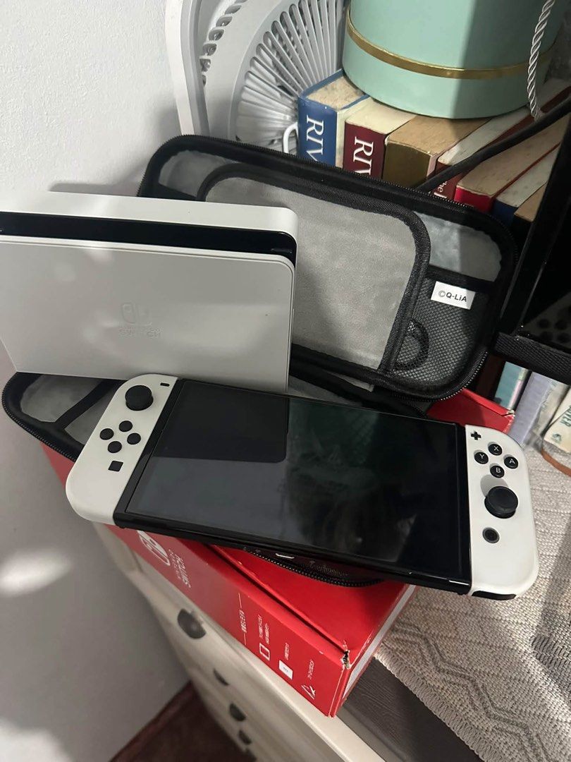 Nintendo Switch Oled (Category: Nintendo) located in Davao. Submitted by mimaebs93 (Listing ID 1463965691, Image 2). Description: 🎮 FOR SALE: NINTENDO SWITCH OLED ✨ Complete set + 2 physical games 🎮 Games included: • Super Mario Odyssey • 100-in-1 Game Collection 📦 Included: • Nintendo Switch OLED complete set • Switch case • 2 physical game cartridges 📌 Ready to use — perfect for personal gaming or as a gift! 📩 PM for inquiries!.