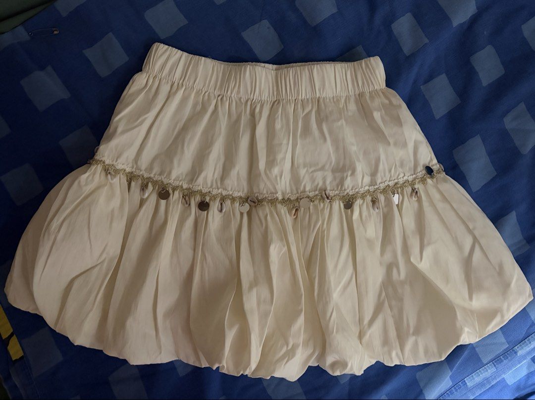 OFF WHITE/ BEIGE BUBBLE SKIRT (Category: Skirts) located in Manila. Submitted by youcatsgfff (Listing ID 1464089770, Image 1). Description: Only used once!!! A local brand here in Bohol and the original price is actually around 800 pesos. For XS to S girlies!.