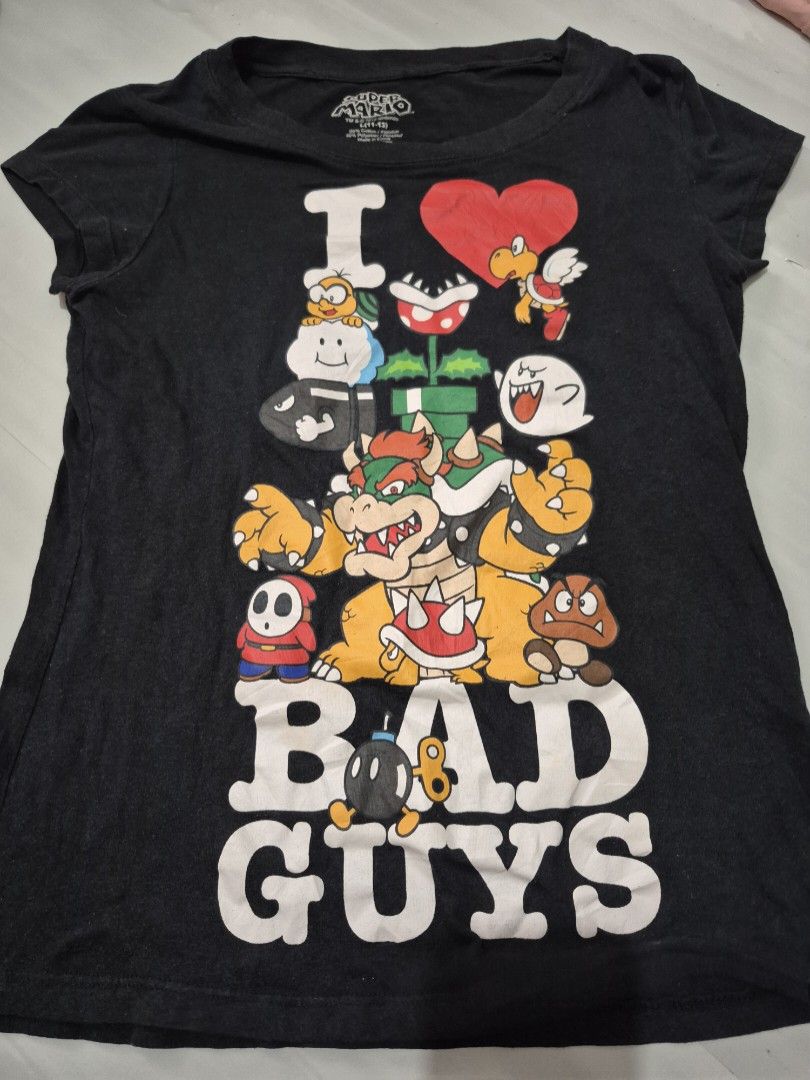 Official Disney & Mario Graphic Tees (Category: Shirts) located in Calamba. Submitted by bb.lace (Listing ID 1463988197, Image 2). Description: 380 aspack pm me for images of flaws di na kasya sa listing Mario L - slight undone stitch on neckline, good print no cracks Minnie XL - signs of usage only Mickey tie dye M - lints magkabilaan sa kilikili Ariel XL - no issue, no crack on print Bo peep S - signs of usage, may stain sa print.