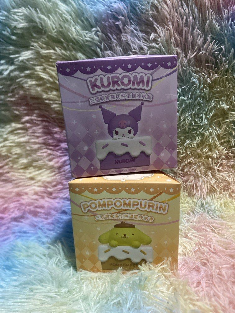 Official/ Licensed Kuromi & Pompompurin Figurine (Category: Figurines & Statues) located in Bulacan. Submitted by cute.finds.ph (Listing ID 1463947755, Image 1). Description: —₱200 each —can be use as small storage —confirmed box, sealed foil.