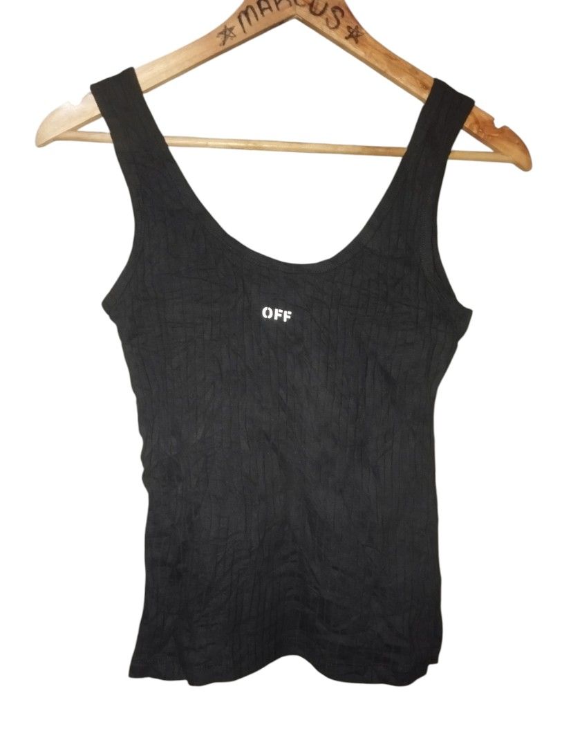 OFF-WHITE Black Ribbed Tank Top (Category: Sleeveless) located in Manila. Submitted by thriftjepo01336 (Listing ID 1464044890, Image 1). Description: - Authentic OFF-WHITE ribbed tank top - Features the signature OFF logo on the chest - Made with comfortable and stretchy material - Versatile for layering or wearing as a standalone piece - Two pieces available for purchase.