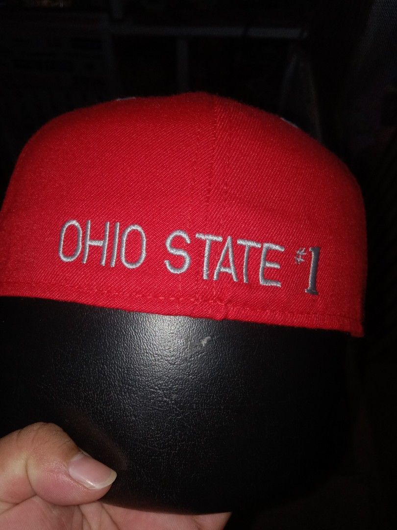Ohio State Buckeyes Snapback Hat Red Grey Size 7 1/4 (Category: Caps & Hats) located in Dumaguete. Submitted by alayon.thrifter (Listing ID 1464062155, Image 3). Description: - Red and grey Ohio State Buckeyes snapback hat - Features the iconic Ohio State logo on the front - 'Ohio State #1' embroidered on the back - Size: 7 3/4 - Proudly Made in the USA - Perfect for any dedicated Buckeyes fan!.