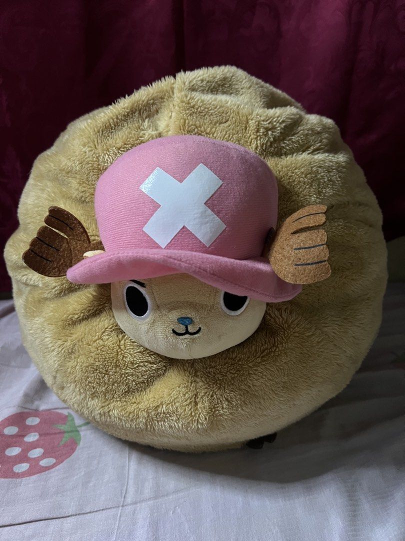 One Piece Chopper Plush Toy - Banpresto (Category: Plushies & Soft Toys) located in Bulacan. Submitted by haven_plushie_dolls.888 (Listing ID 1464076699, Image 1). Description: - Adorable, round, and fluffy Chopper plush toy from One Piece. - Features his signature pink hat with a cross. - Authentic Banpresto merchandise. - Soft and huggable, ideal for cuddling. - Makes a great display piece for any fan's collection..