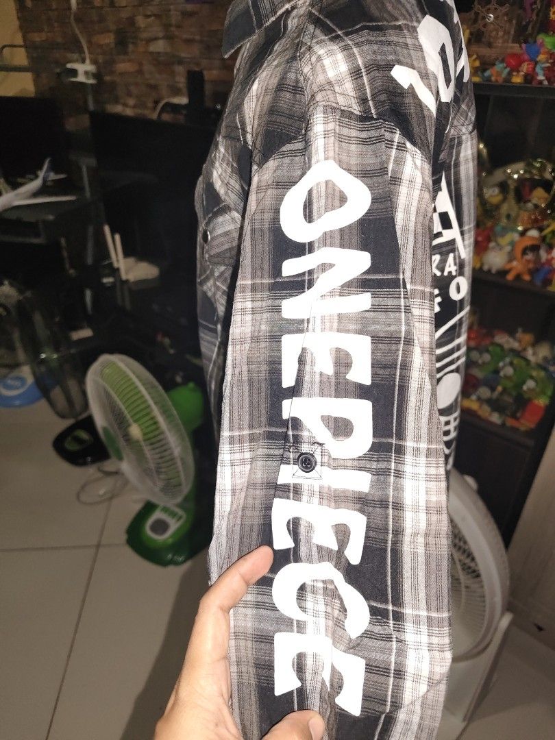 One Piece Plaid Long Sleeve Shirt (Category: Babies & Kids Fashion) located in Manila. Submitted by duffy-080 (Listing ID 1464032603, Image 3). Description: - Stylish plaid long sleeve shirt - Features cool One Piece graphics - Includes patches on the front - Large prints on the back and sleeve - Classic button-up design - Ideal for any One Piece fan.