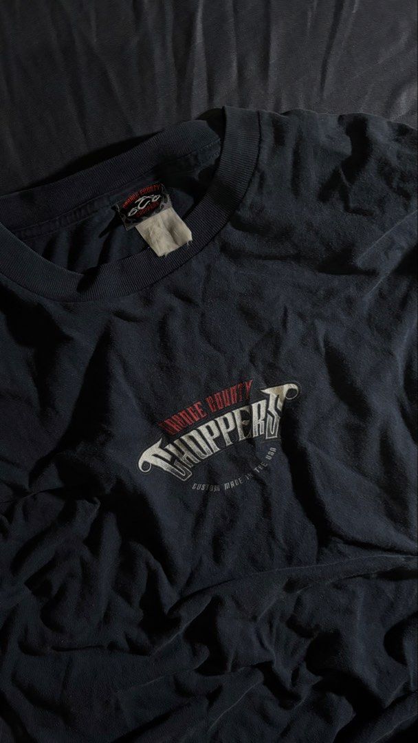 Orange County Choppers Long Sleeve (Category: Coats, Jackets and Outerwear) located in Manila. Submitted by zahradiane33509 (Listing ID 1464097794, Image 2). Description: - Black long sleeve t-shirt from Orange County Choppers (OCC) - Classic OCC logo on the front and back - Eye-catching flame graphics on both sleeves Good quality, looks brand new but has slight signs of usage - stitching rate 10/10 - fabric quality 9/10 - print rate 10/10 Fits M