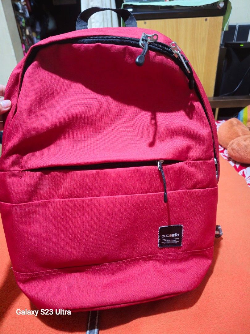 Pacsafe Slingsafe LX 300 Backpack (Category: Backpacks) located in Quezon City. Submitted by bagsforless16 (Listing ID 1463982767, Image 1). Description: Pacsafe Slingsafe LX 300 Backpack Color: Red Durable Material Stylish Design Perfect for Everyday Use Padded Laptop Slot Top Hook Clean Ready to Use Size: 15" x 13" x 6" .
