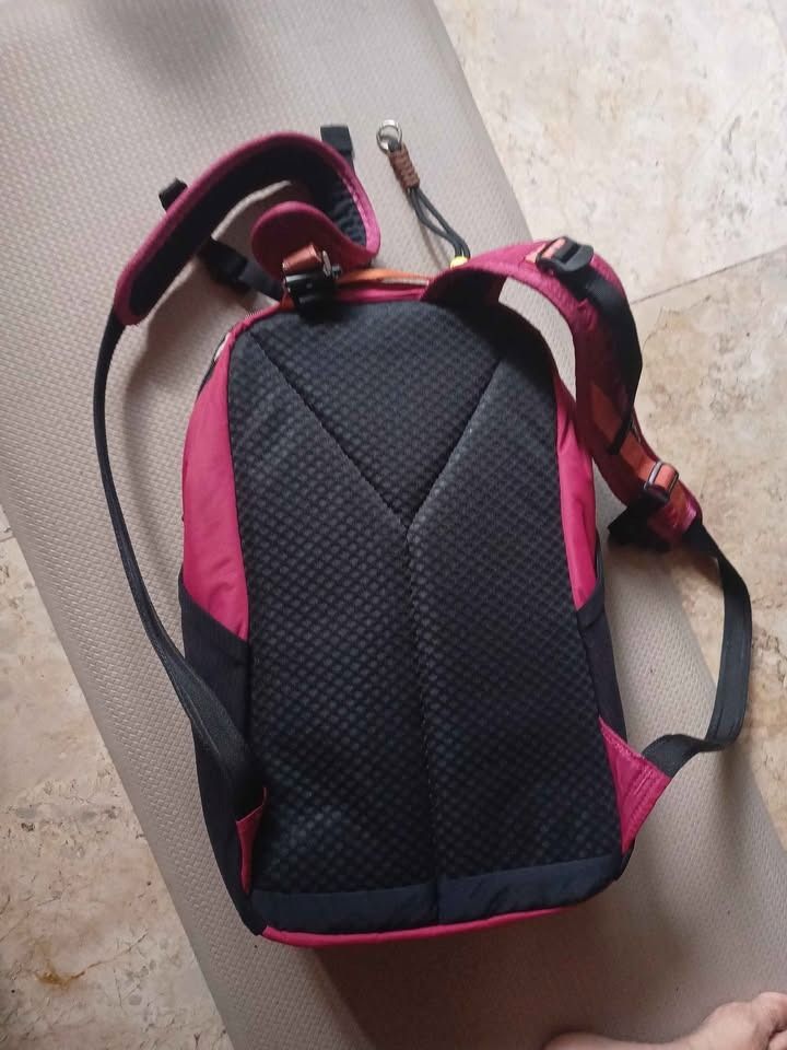 Pacsafe Vibe 25L Backpack - Magenta (Category: Backpacks) located in Manila. Submitted by dongdongv (Listing ID 1463949743, Image 3). Description: - Pacsafe Vibe backpack in a stylish pink and black colorway. - Perfect size for daily commutes or short getaways. - Features multiple internal compartments for excellent organization. - Padded back panel and shoulder straps ensure maximum comfort. - All zippers are in smooth working condition. - This 