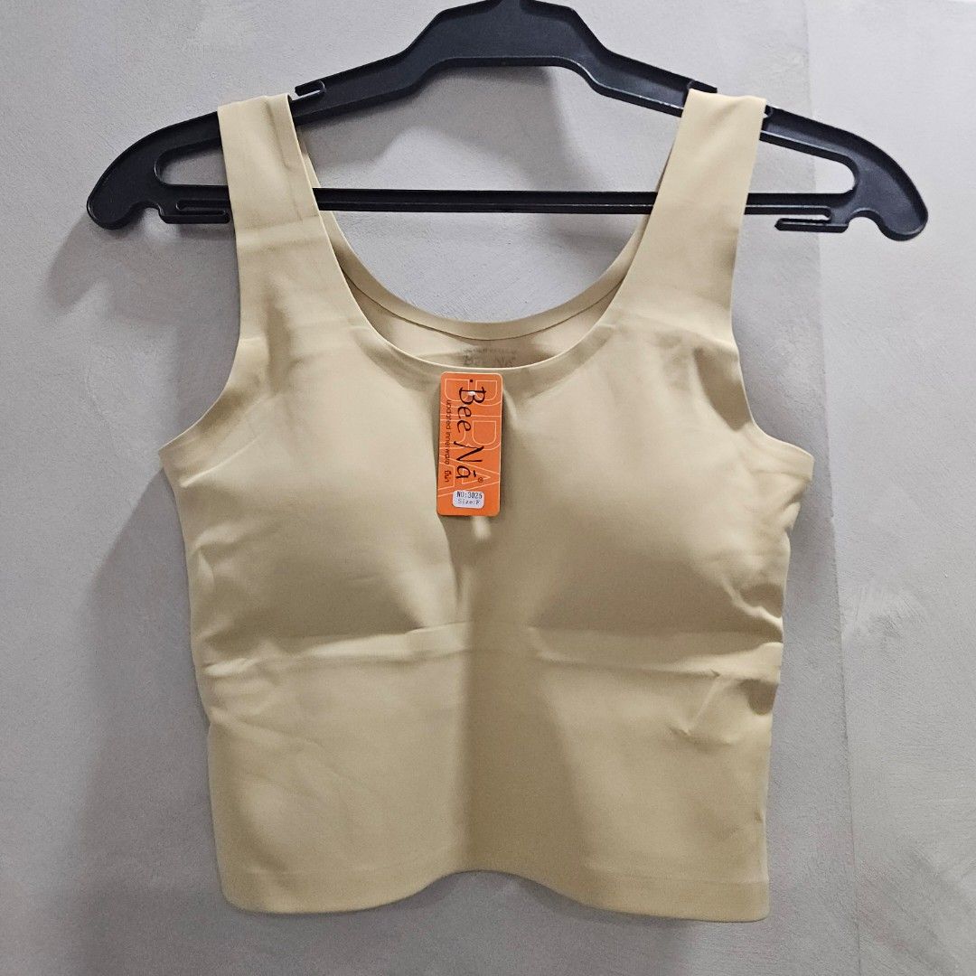 Padded seamless inner top (Category: Sleeveless) located in Quezon City. Submitted by k_closetsale (Listing ID 1463945786, Image 1). Description: padded seamless inner top free size up to 36bust nude color semi crop there's a little stain from storage as shown in the photo but washable.