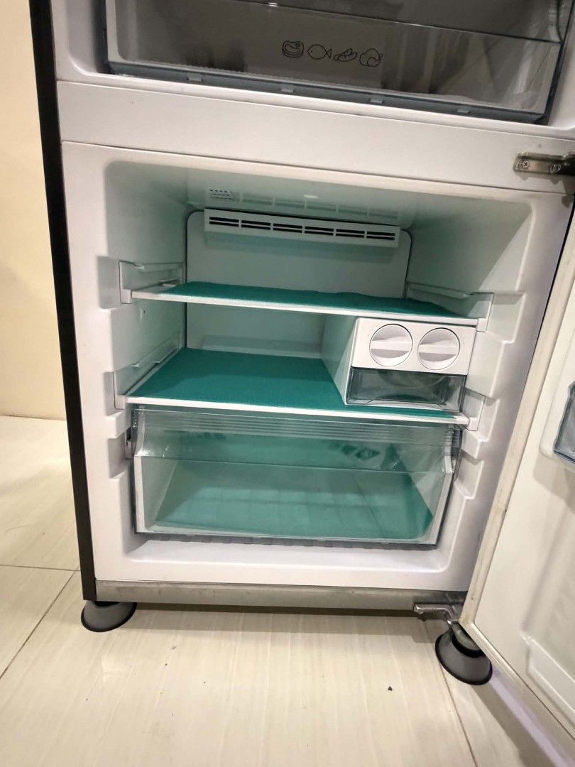 Panasonic Refrigerator - Black (Category: Refrigerators and Freezers) located in Manila. Submitted by wynzonline4 (Listing ID 1464015432, Image 3). Description: - Black Panasonic Refrigerator - Two Doors with Top Freezer - Clean Interior with Shelves and Drawers - Keeps Food Fresh - Works Well - Pick Up Only.