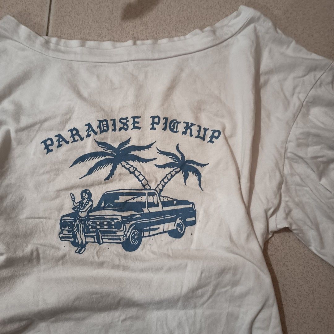 Paradise pickup graphic tee (Category: Blouses) located in Adams. Submitted by luckygirl.closet (Listing ID 1464020872, Image 2). Description: m-l baggy fit like new.