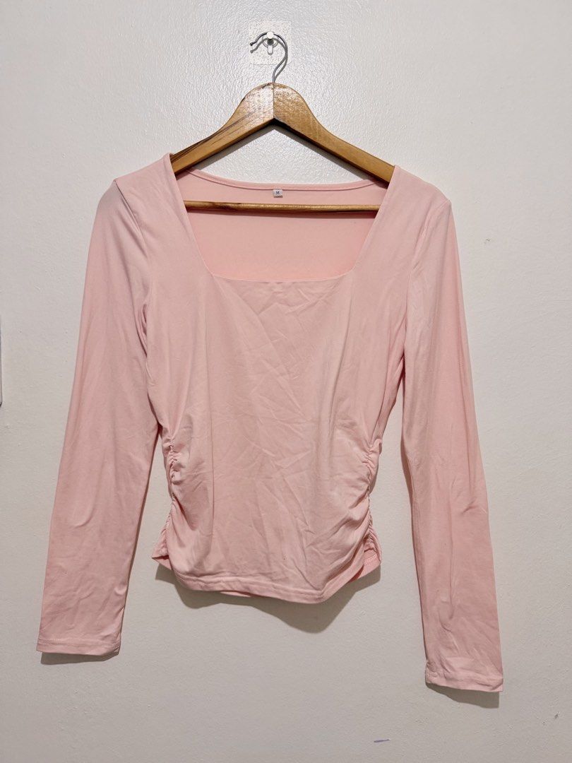 Pastel Pink Square Neck Long Sleeve Top (Category: Longsleeves) located in Caloocan City. Submitted by ashpreloves (Listing ID 1464083611, Image 1). Description: - Cute pink long-sleeved top - Flattering square neckline - Side ruched detailing - Soft and stretchy fabric - Versatile for casual or dressed-up outfits - Easy to pair with jeans or skirts.
