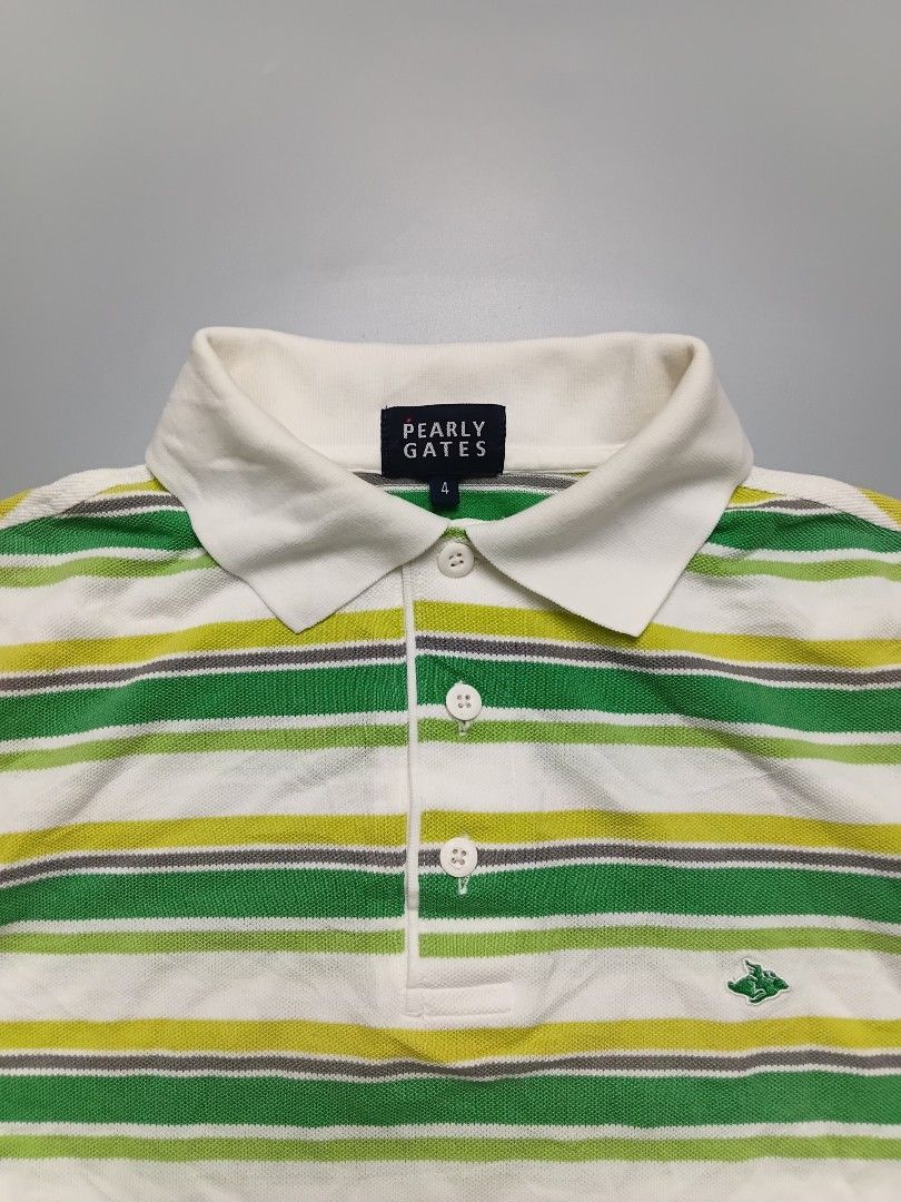 Pearly Gates. POLO SHIRT (Category: Tshirts & Polo Shirts ) located in Manila. Submitted by hustler_777 (Listing ID 1464034820, Image 2). Description: Key Features Observed:Brand Label: The inner neck tag explicitly reads "PEARLY GATES" with a size number 4 printed right below it.Signature Logo: On the lower right chest area, there is a small embroidered green rabbit flying motif, which is the iconic mascot of the brand.Design & Styling: Features