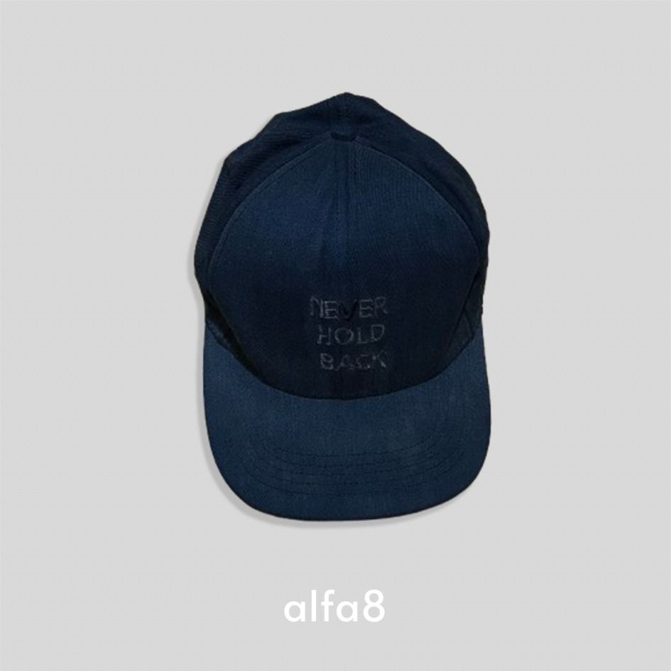 Penshoppe "Never Hold Back" Navy Blue Baseball Cap (Category: Caps & Hats) located in Imus. Submitted by alfa_8 (Listing ID 1464015915, Image 2). Description: Free Size (Adjustable strap at the back, fits standard adult heads comfortably) Minimalist / Streetwear Basics / Clean Look / Casual Everyday Condition: 8.5/10 (Pre-loved, very clean condition with strong structural integrity) Details: Comes in a rich, versatile navy blue colorway. Features