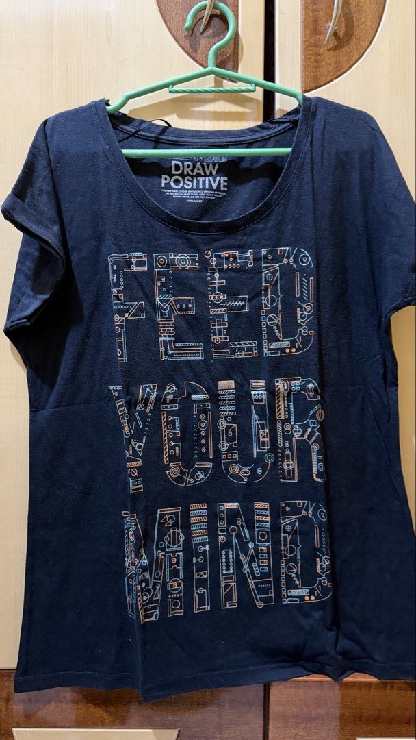Penshoppe x Status Draw Positive Graphic Tee Extra Large (Category: Shirts) located in Manila. Submitted by nayeoniescart (Listing ID 1464103496, Image 1). Description: PRE LOVED Penshoppe x Status MOP: gcash / MOD: jnt - Color: Black - Size: Extra Large (XL) - Design: Features 'Draw Positive' slogan with a cool mechanical graphic - Style: Casual, easy to pair with jeans or shorts.