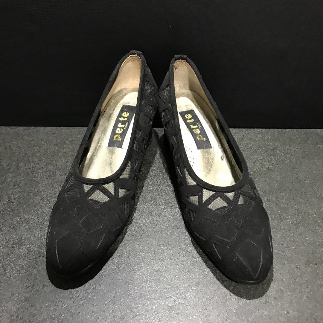 PERTE Black Mesh Cut-out Block Heels (Category: Heels) located in Baao. Submitted by all.things.japan (Listing ID 1463993011, Image 2). Description: - Brand: PERTE - Color: Black - Design: Mesh cut-out with geometric pattern - Heel Type: Comfortable block heel - Style: Versatile, perfect for dressing up or down - Condition: Good.