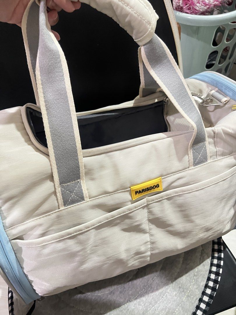 Pretty Bubble Pet Carrier Bag (Category: Homes & Other Pet Accessories) located in Makati City. Submitted by mimagrizz (Listing ID 1464043163, Image 1). Description: Bought in Pet Express for ₱2,800. Used twice Will give free s-m diapers • Lightweight pet carrier bag. • Has mesh panels for ventilation on multiple sides. • The front panel opens up fully for easy access. • Comes with a removable padded base. Great for small pets on the go. • Easy t
