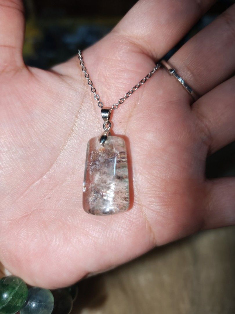 Phantom Quartz Pendant (Category: Necklaces) located in Quezon City. Submitted by piaoliangcollections.ph (Listing ID 1463953686, Image 1). Description: Phantom quartz is a unique crystal believed to promote spiritual growth, personal transformation, and the release of past emotional blockages. Spiritual and Emotional Benefits Personal Transformation: Symbolizes the journey of evolution, helping you move past stagnation and embrace major life tra