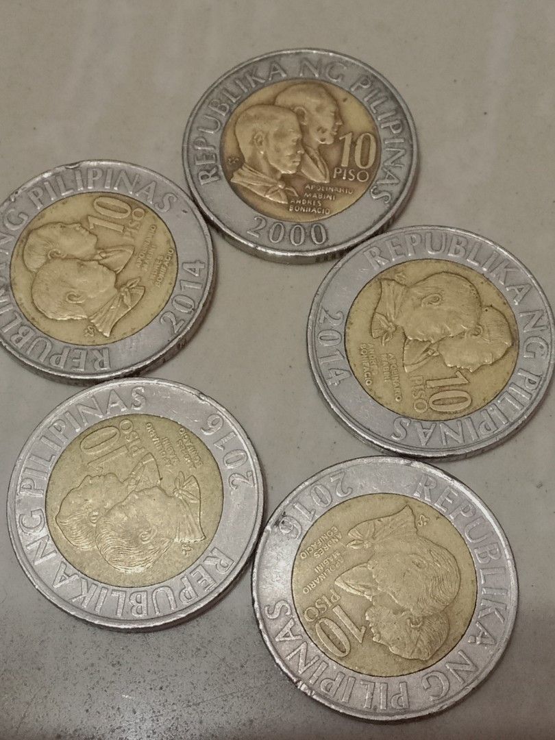 Philippine 10 Piso Coins - 2000, 2014, 2015, 2016 (Category: Currency) located in Manila. Submitted by bbonggeez14 (Listing ID 1464097010, Image 1). Description: - Set of 5 Philippine 10 Piso coins - Includes years: 2000, 2014, 2015, 2016 - Ideal for coin collectors and currency enthusiasts - All coins clearly shown in photos - Feel free to ask any questions.