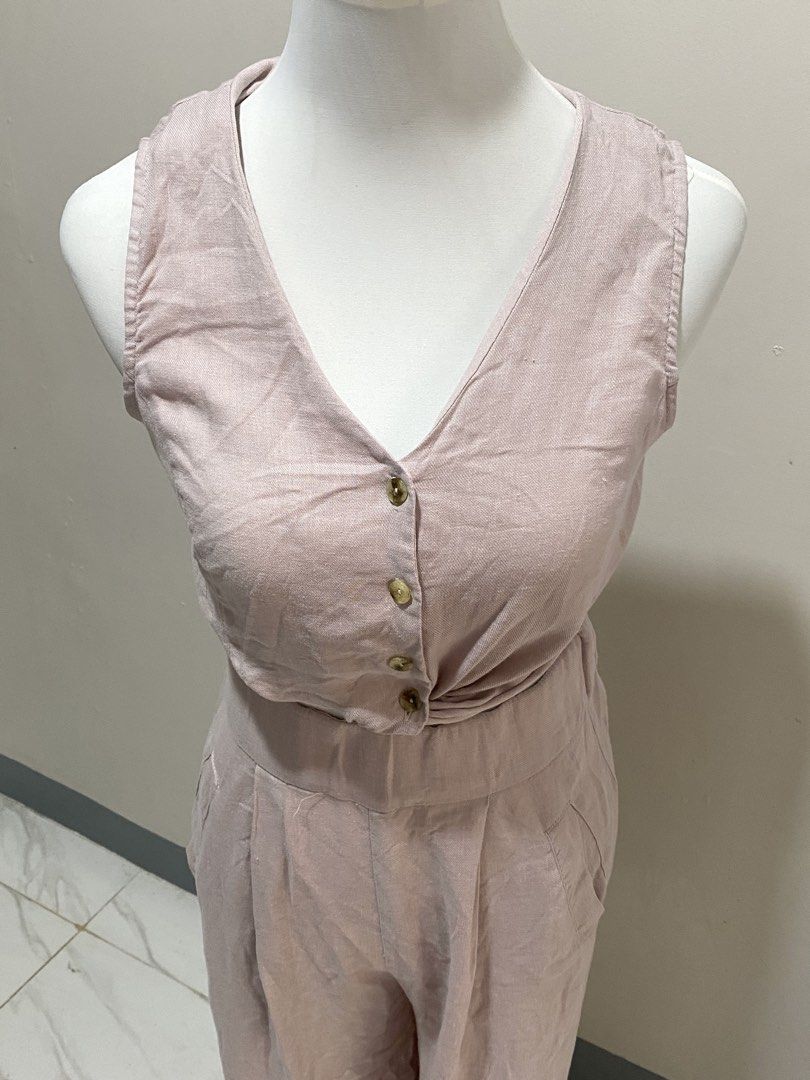 Pink Linen jumper (Category: Sets or Coordinates) located in Manila. Submitted by toastybread (Listing ID 1464023443, Image 3). Description: - Adorable pink linen blend set - Sleeveless crop top with button front and tie waist - High-waisted pants with convenient pockets - Comfortable and stylish for any occasion - Versatile for casual outings or dressing up.