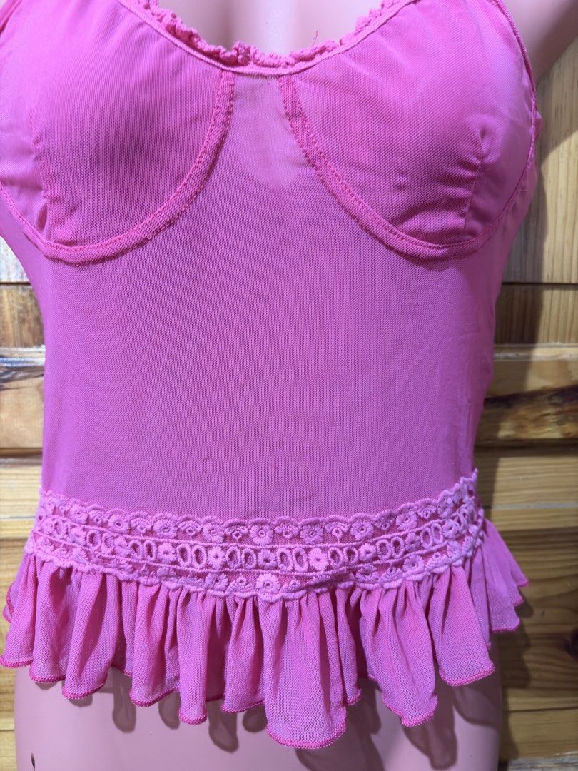 Pink Mesh Ruffle Lingerie Top with Underwire (Category: Sleeveless) located in Baguio. Submitted by declutterbycys (Listing ID 1464057947, Image 1). Description: - Adorable pink mesh lingerie top - Built-in underwire for excellent support - Pretty ruffled hem with decorative lace band - Adjustable spaghetti straps for a perfect fit - Versatile: great for layering or as a standalone piece.