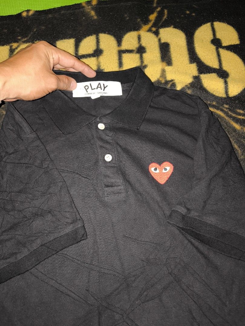 PLAY COMME des GARÇONS Polo shirt (Category: Tshirts & Polo Shirts ) located in Manila. Submitted by fljaoti27 (Listing ID 1463957362, Image 2). Description: Play Polo Shirt Large on tag best fit Small.